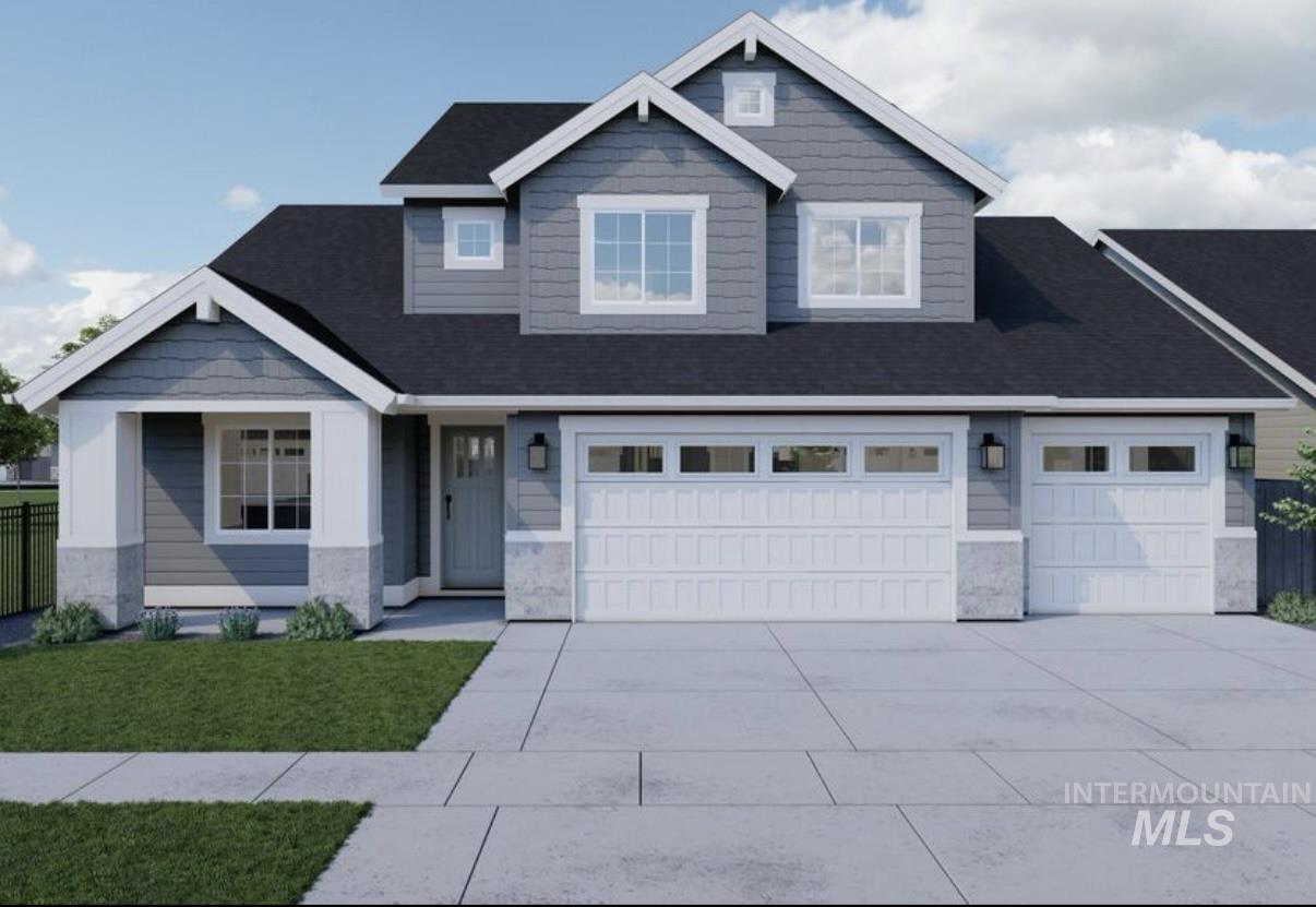 6548 South Utmost Lane Meridian, ID 83642 - Photo 1 of 3 Craftsman house featuring concrete driveway, a garage, an attached garage, and stone siding