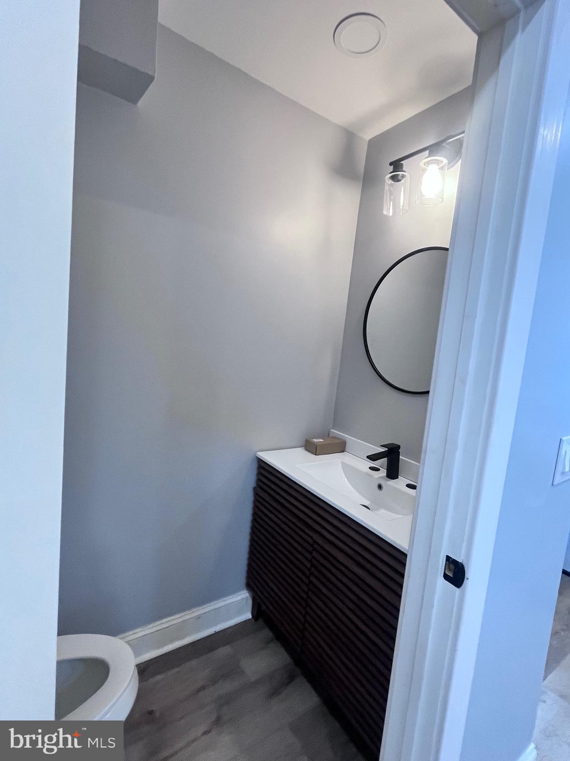 2520 West Seybert Street Philadelphia, PA 19121 - Photo 11 of 40 a bathroom with a sink toilet and vanity
