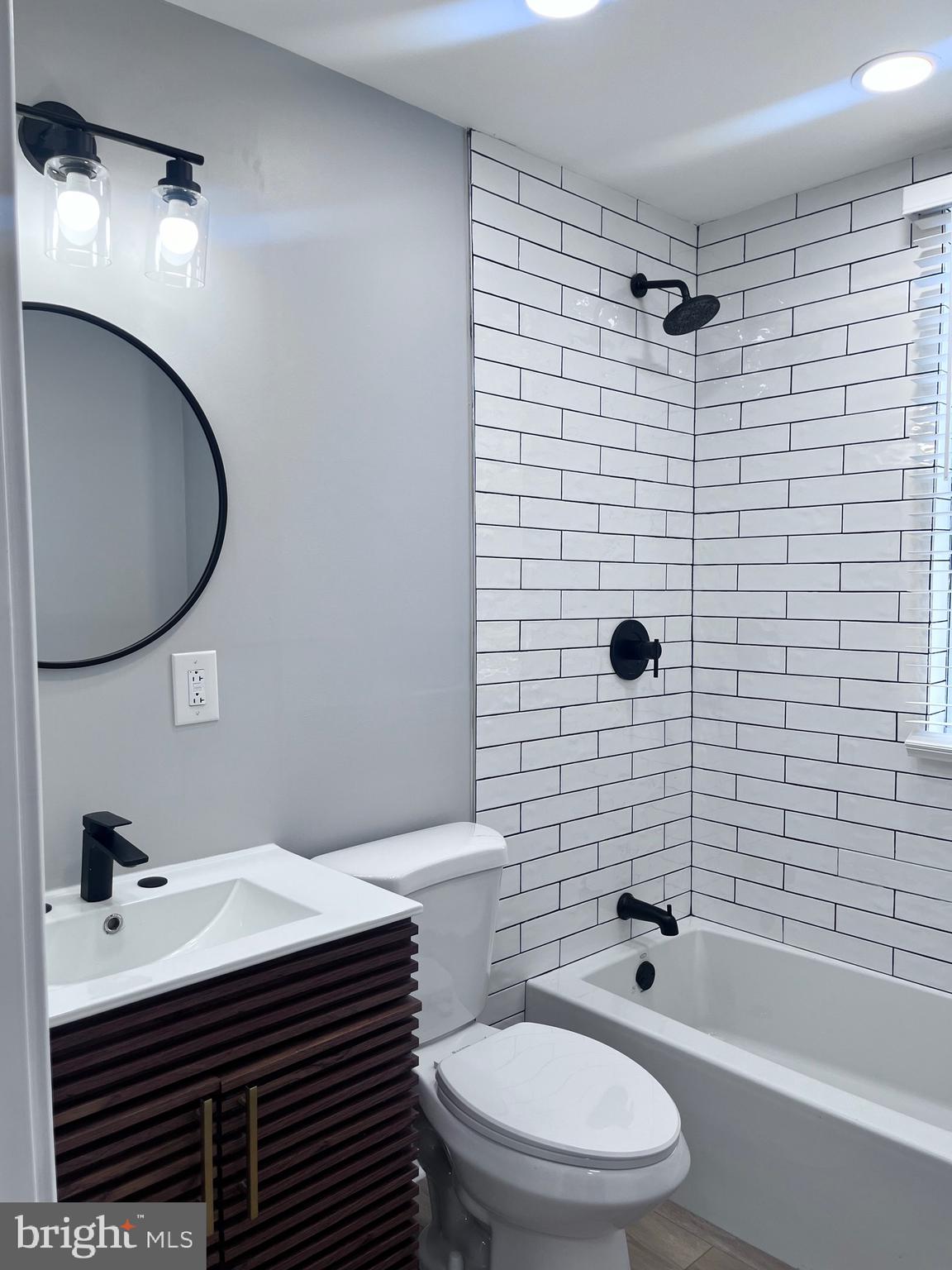 2520 West Seybert Street Philadelphia, PA 19121 - Photo 31 of 40 a bathroom with a sink toilet and shower