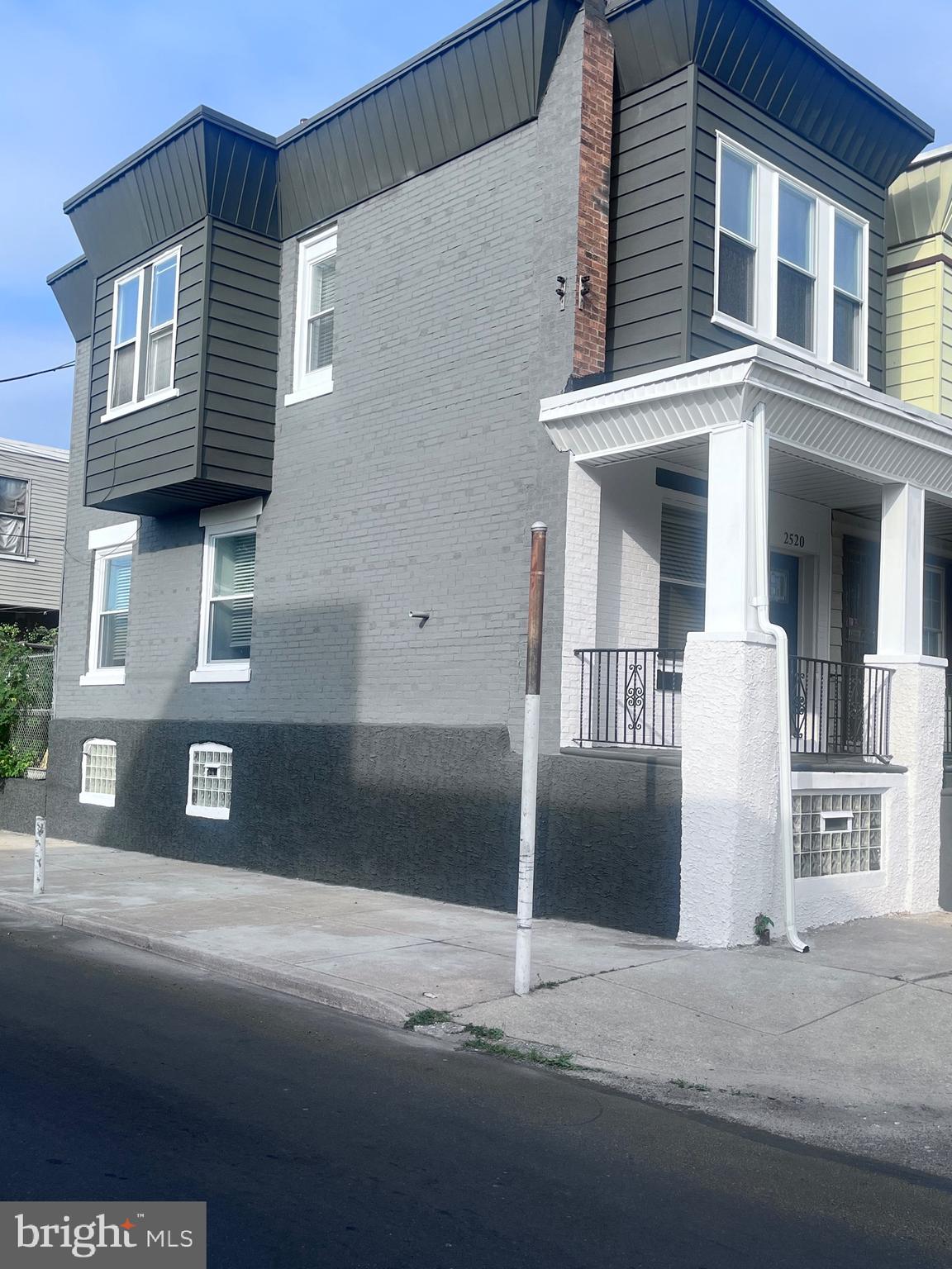 2520 West Seybert Street Philadelphia, PA 19121 - Photo 6 of 40 a front view of a house with a garage
