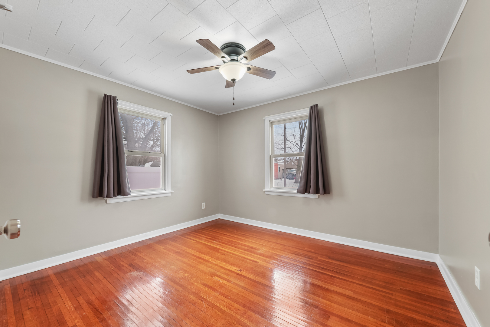 1428 Pickwick Street Ottawa, IL 61350 - Photo 11 of 14 a view of an empty room with wooden floor and a window