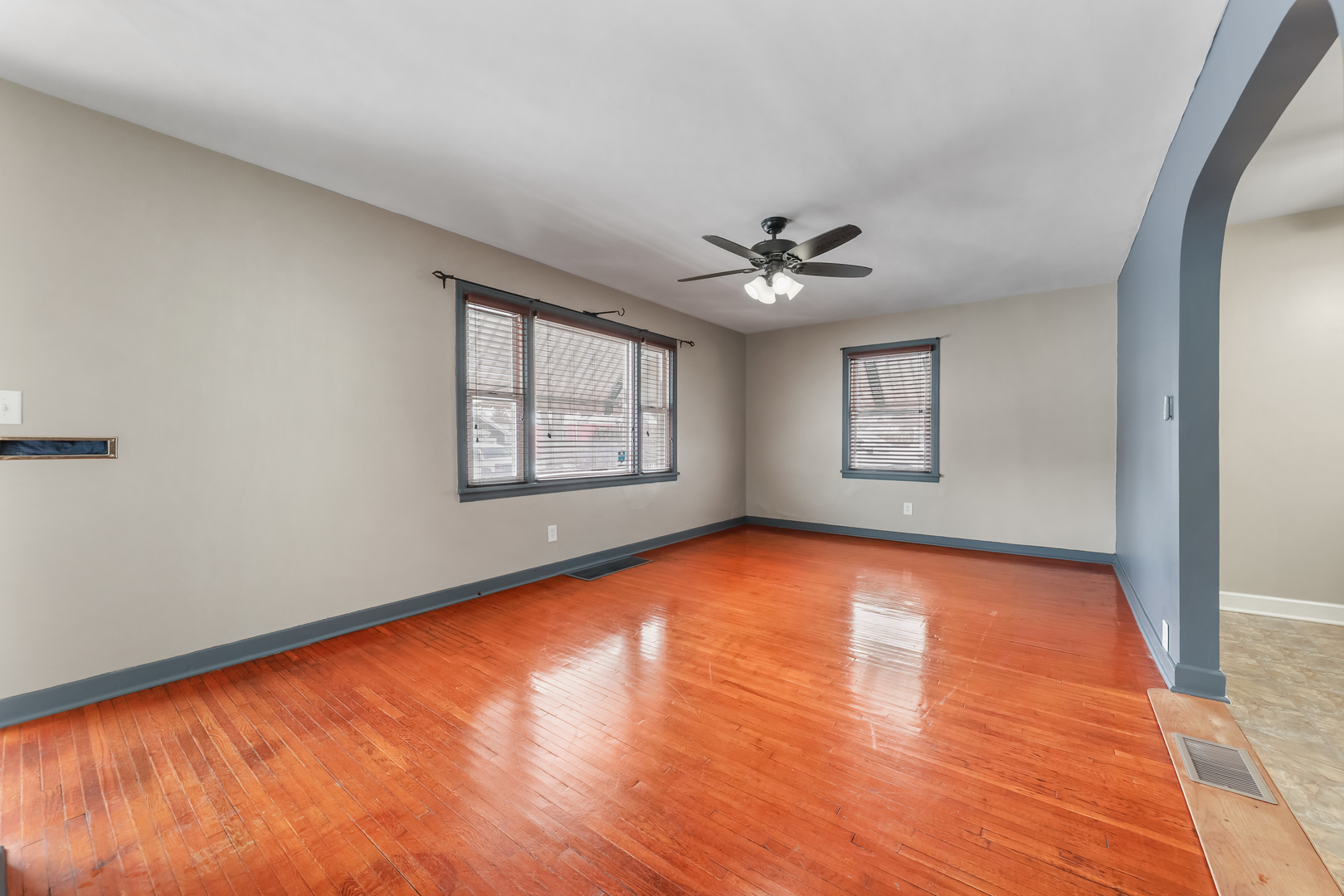 1428 Pickwick Street Ottawa, IL 61350 - Photo 5 of 14 wooden floor in an empty room with a window