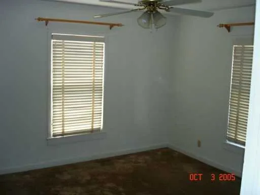 a view of a room that has a window in it