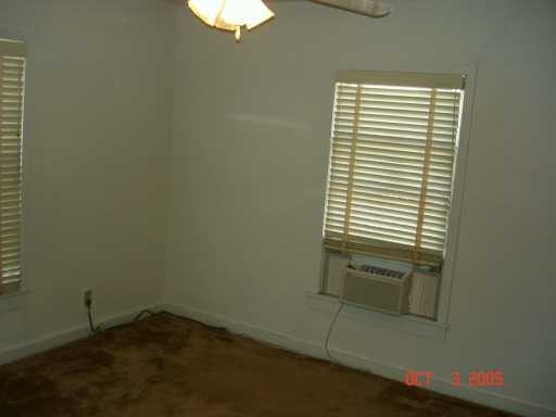 Undisclosed Address Corpus Christi, TX 78404 - Photo 7 of 8 an empty room with a window