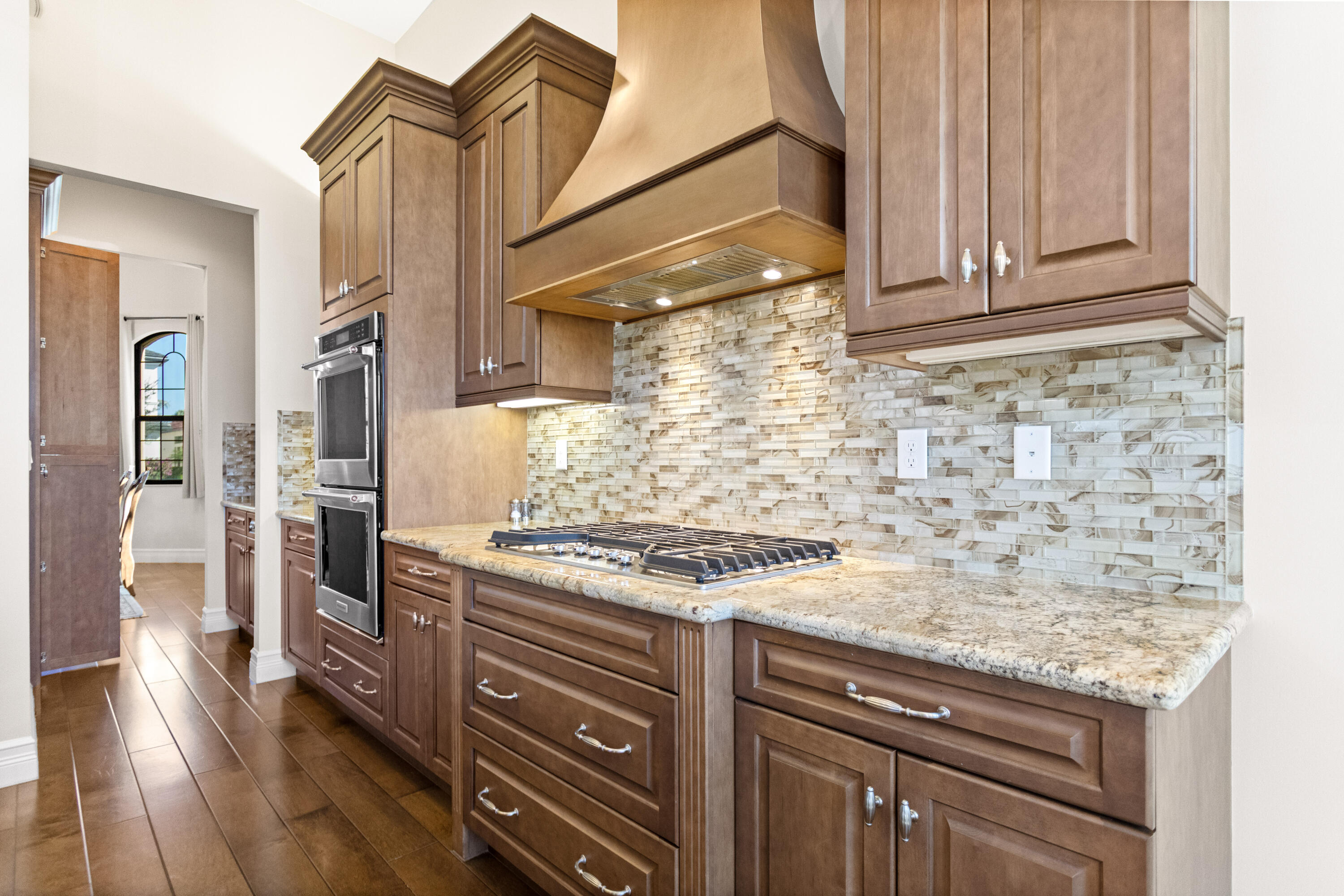 16743 Picardy Way Delray Beach, FL 33446 - Photo 13 of 79 a kitchen with stainless steel appliances granite countertop a stove and a refrigerator