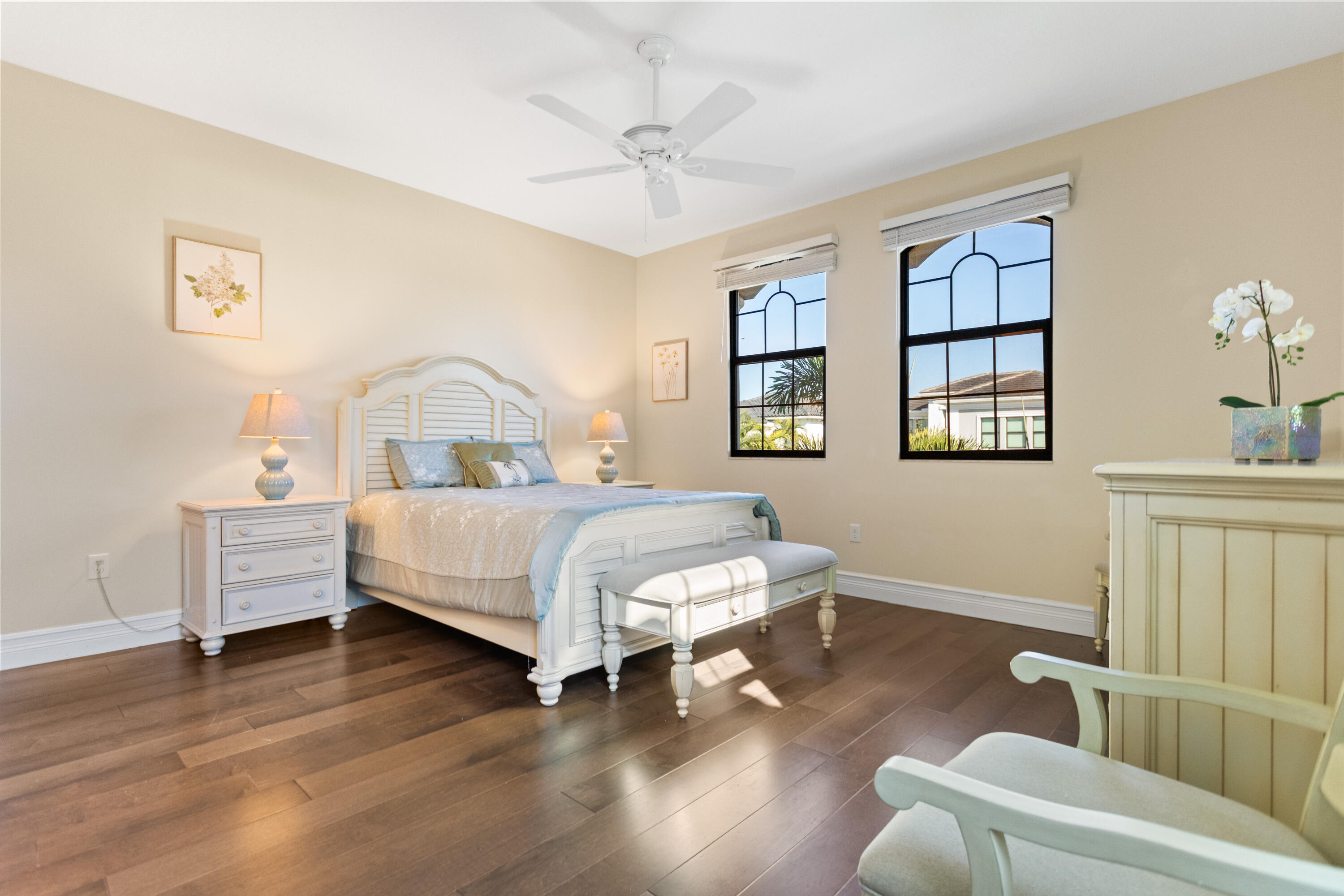 16743 Picardy Way Delray Beach, FL 33446 - Photo 36 of 79 a bedroom with a bed wooden floor and window