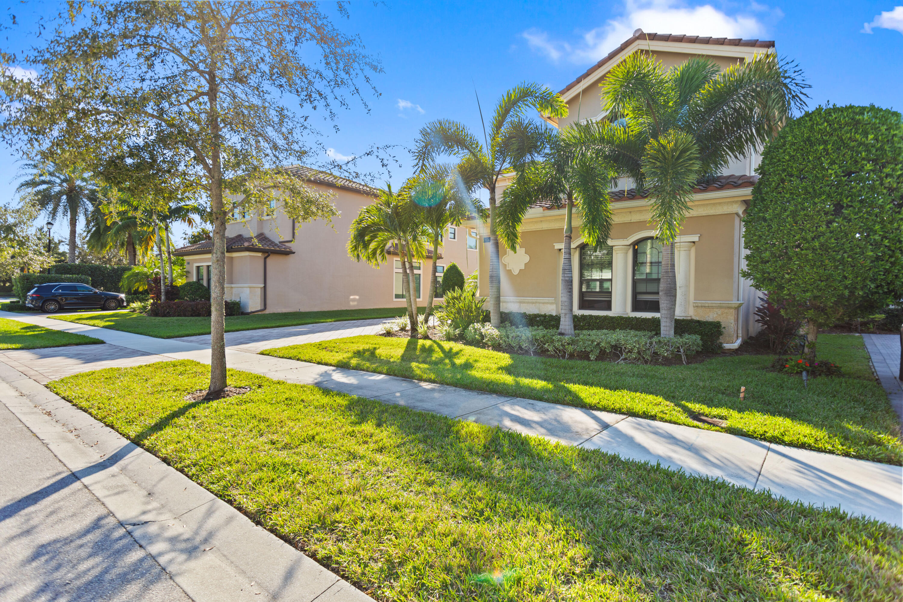 16743 Picardy Way Delray Beach, FL 33446 - Photo 53 of 79 a view of a house with swimming pool and yard