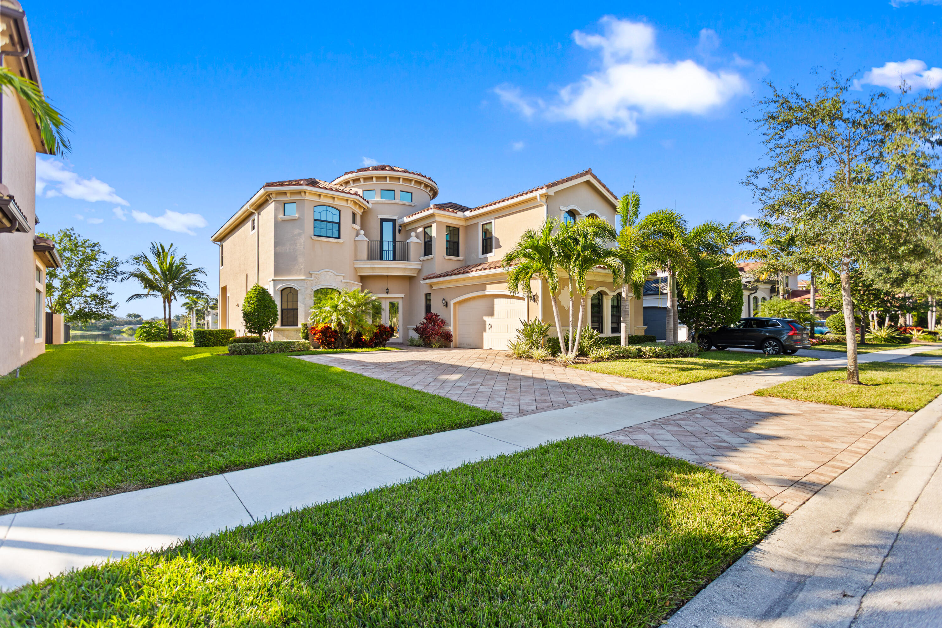 16743 Picardy Way Delray Beach, FL 33446 - Photo 6 of 79 a front view of a house with a yard