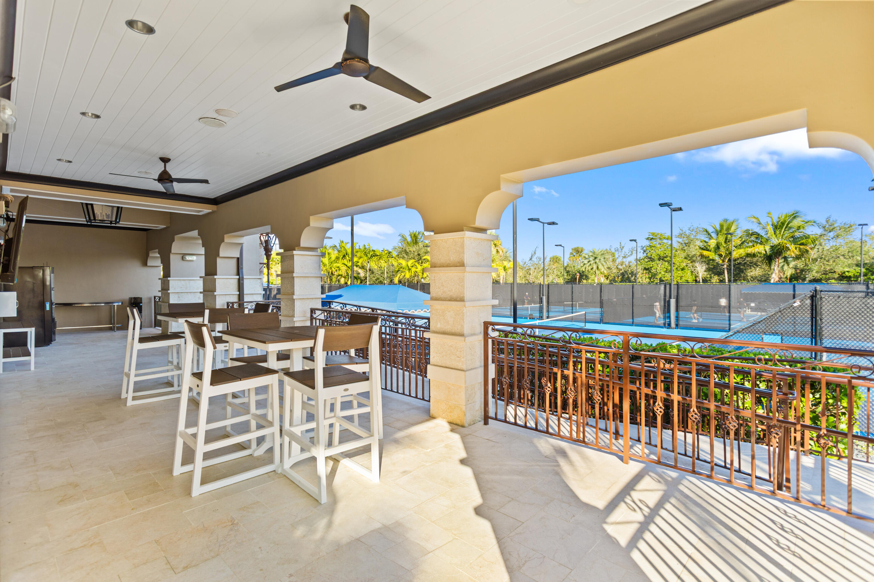 16743 Picardy Way Delray Beach, FL 33446 - Photo 62 of 79 a view of a chairs and table in the balcony