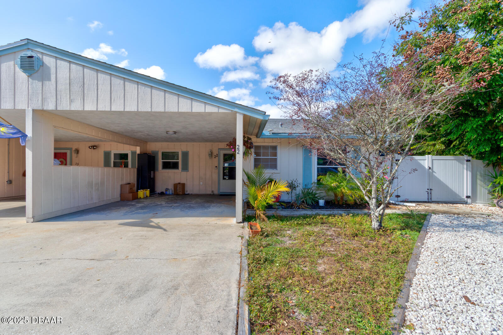 22 Red Maple Circle Ormond Beach, FL 32174 - Photo 1 of 1 a view of a house with backyard and a tree