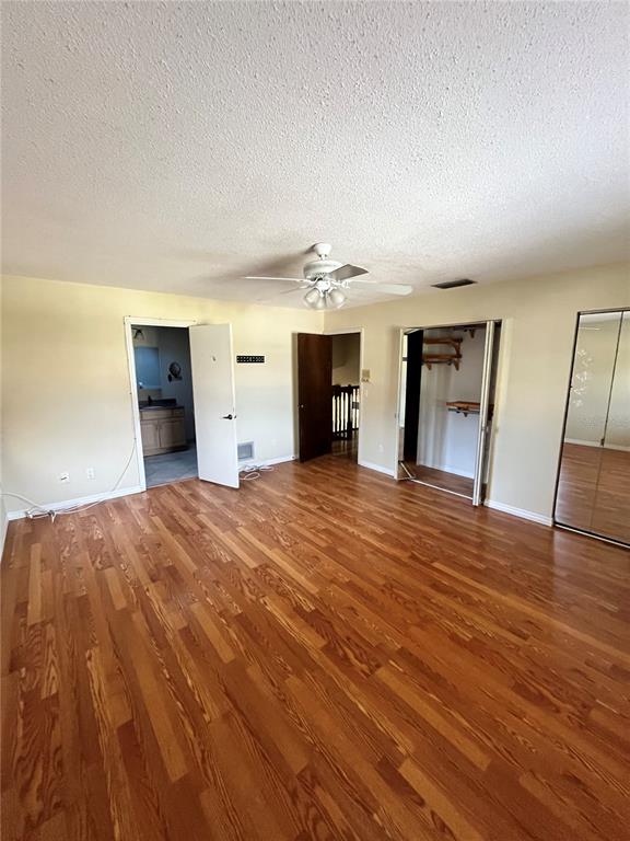 941 Mill Rd Lane Port Orange, FL 32127 - Photo 11 of 24 a big room with wooden floor and windows
