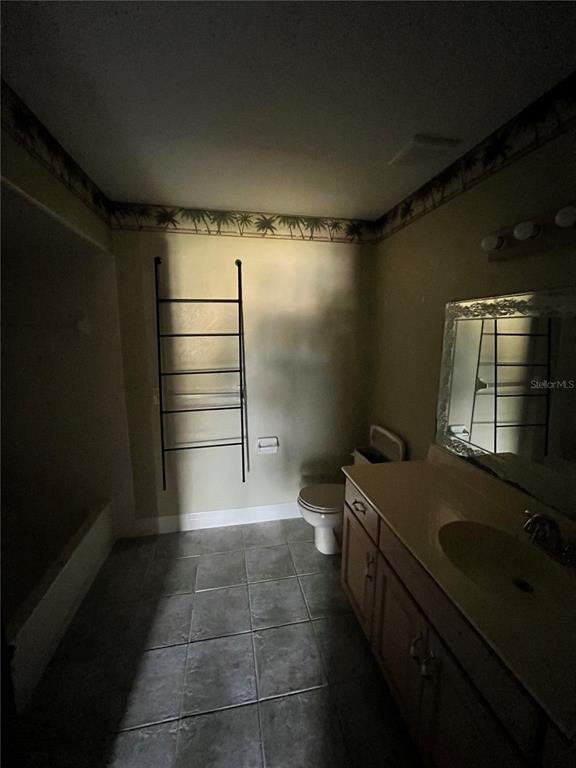 941 Mill Rd Lane Port Orange, FL 32127 - Photo 16 of 24 a bathroom with a sink toilet and shower