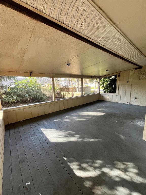 941 Mill Rd Lane Port Orange, FL 32127 - Photo 22 of 24 a view of an empty room with windows