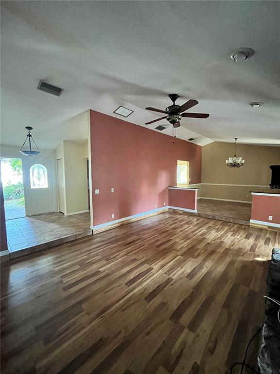 941 Mill Rd Lane Port Orange, FL 32127 - Photo 9 of 24 wooden floor in an empty room