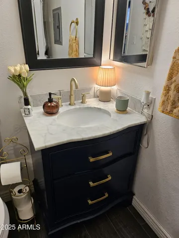 a bathroom with a sink and a toilet