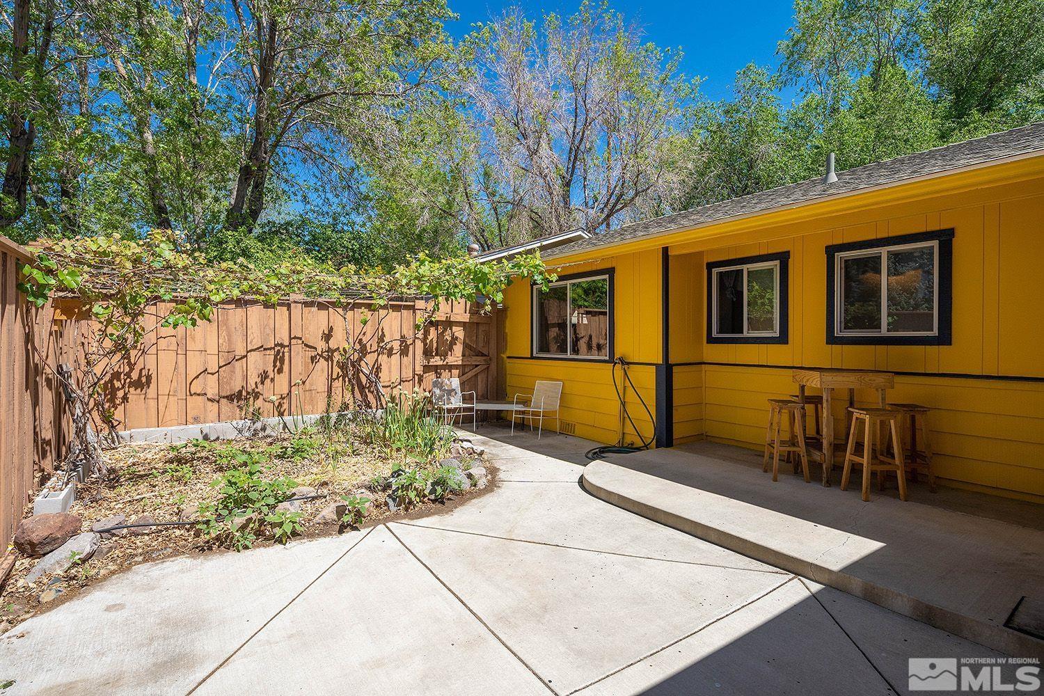 1245 Kings Row Reno, NV 89503 - Photo 16 of 24 a front view of a house with a yard
