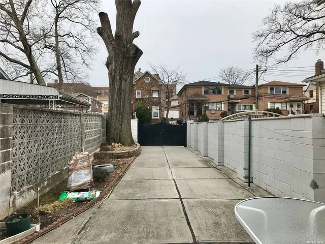 a front view of a building with parking space