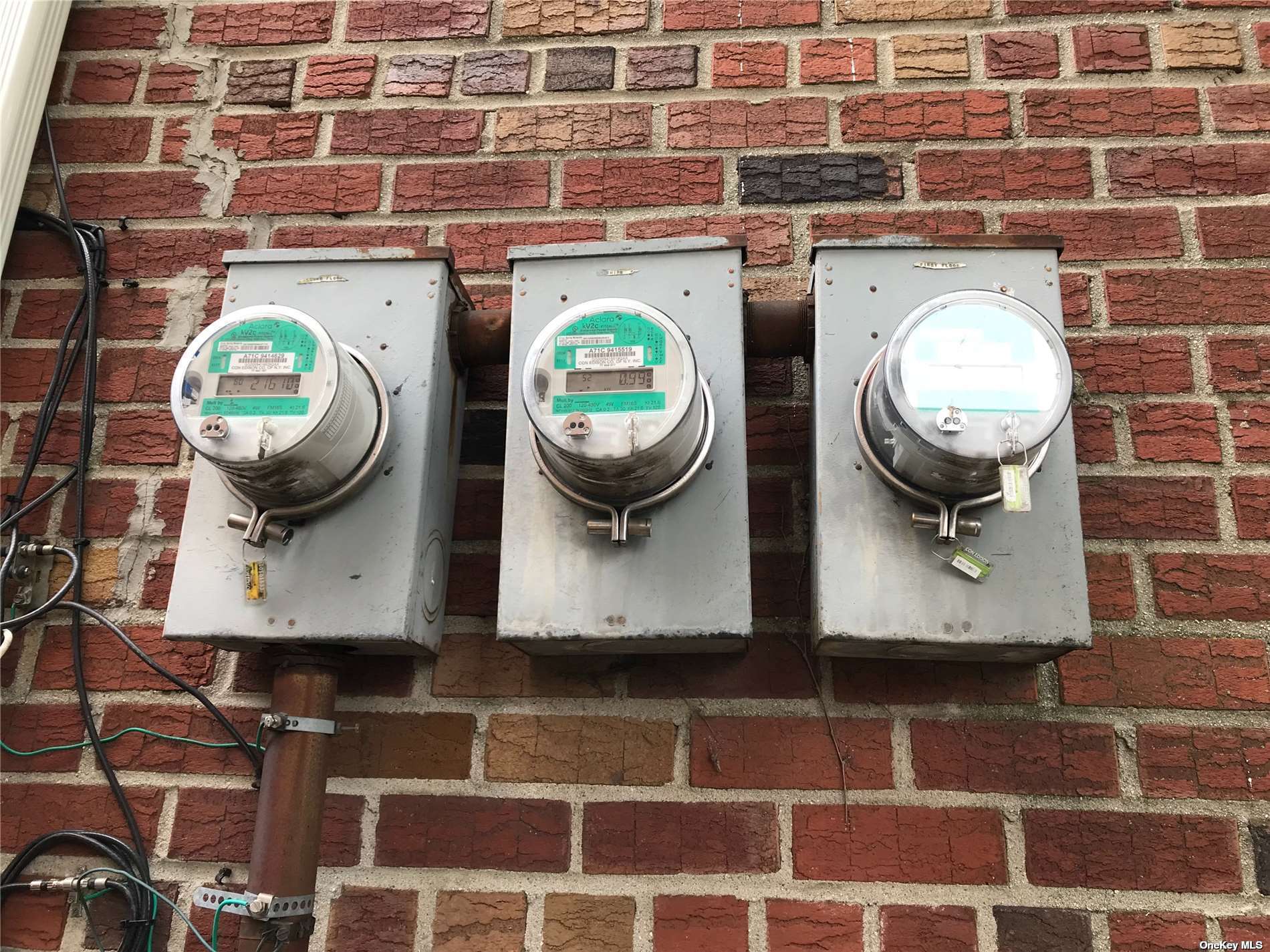 170-15 84th Drive Queens, NY 11432 - Photo 13 of 15 a bathroom with a sink and a mirror