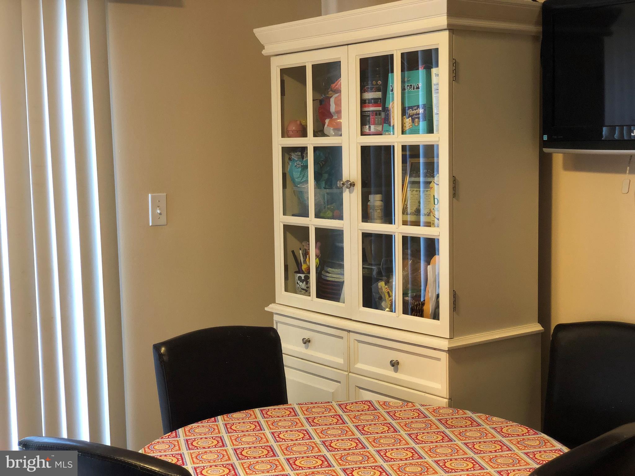 8989 Centerway Road Gaithersburg, MD 20879 - Photo 22 of 26 a bedroom with a bed and a window