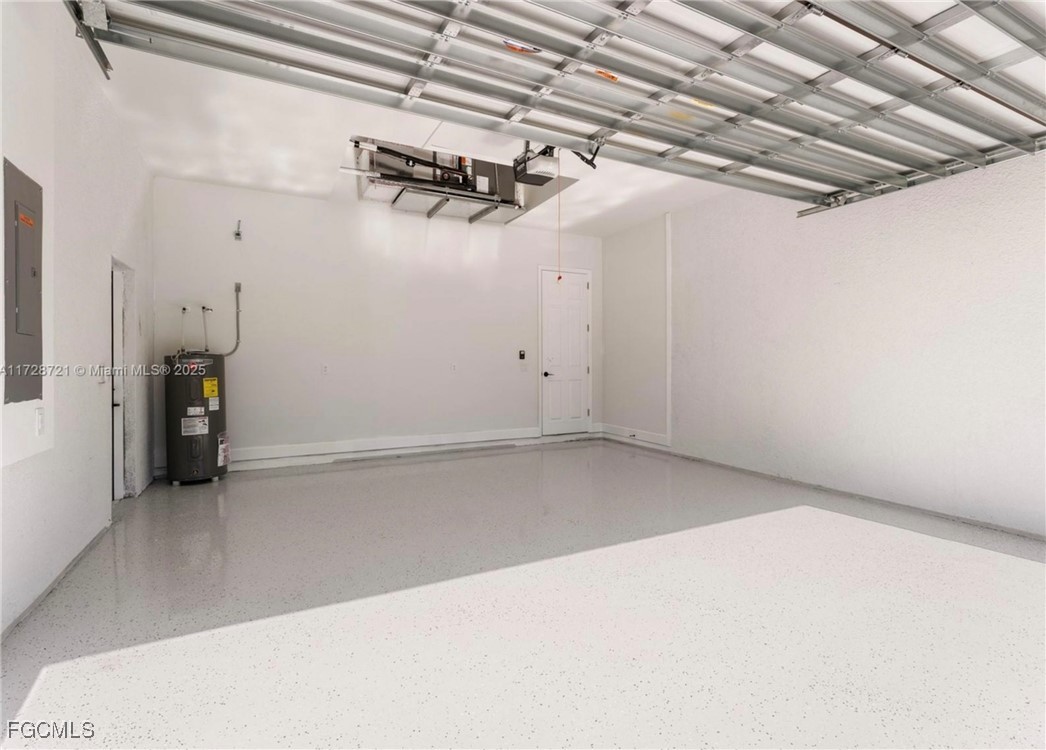 729 Giorgio Avenue Lehigh Acres, FL 33974 - Photo 21 of 21 a view of a room with racks on the wall