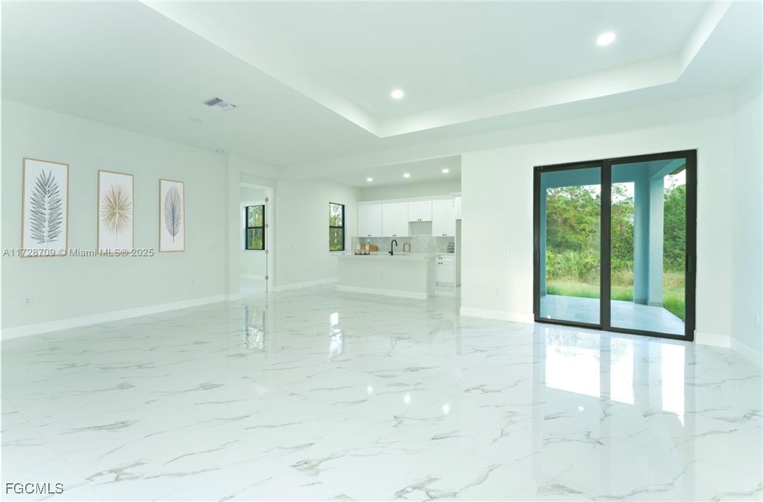 729 Giorgio Avenue Lehigh Acres, FL 33974 - Photo 8 of 21 a view of a room with window