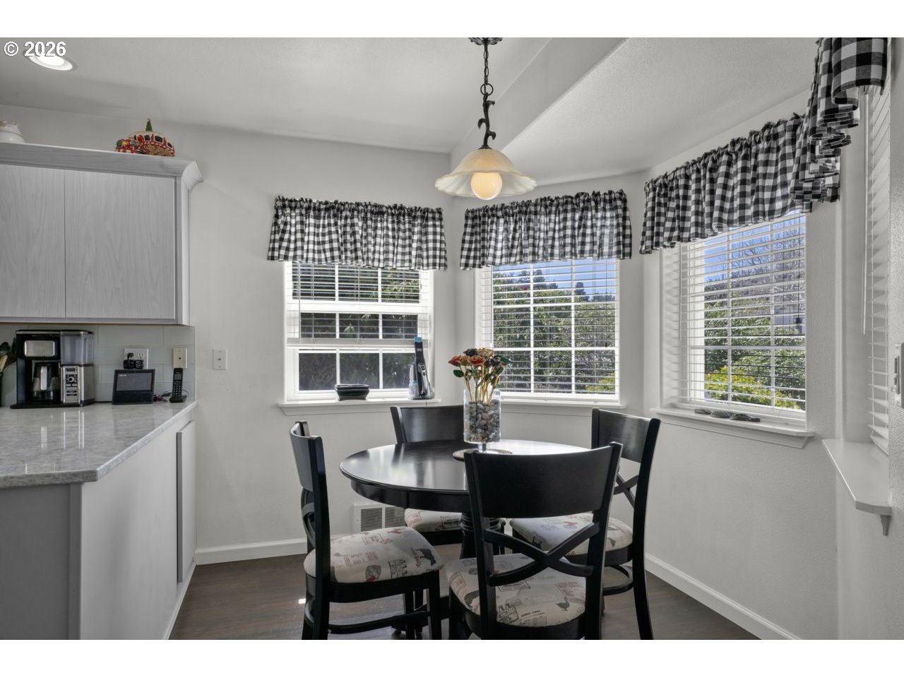 7 Onadoone Court Florence, OR 97439 - Photo 12 of 44 a view of a dining room with furniture window and outside view
