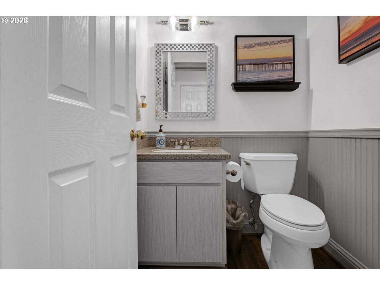 7 Onadoone Court Florence, OR 97439 - Photo 20 of 44 a bathroom with a toilet a sink and mirror