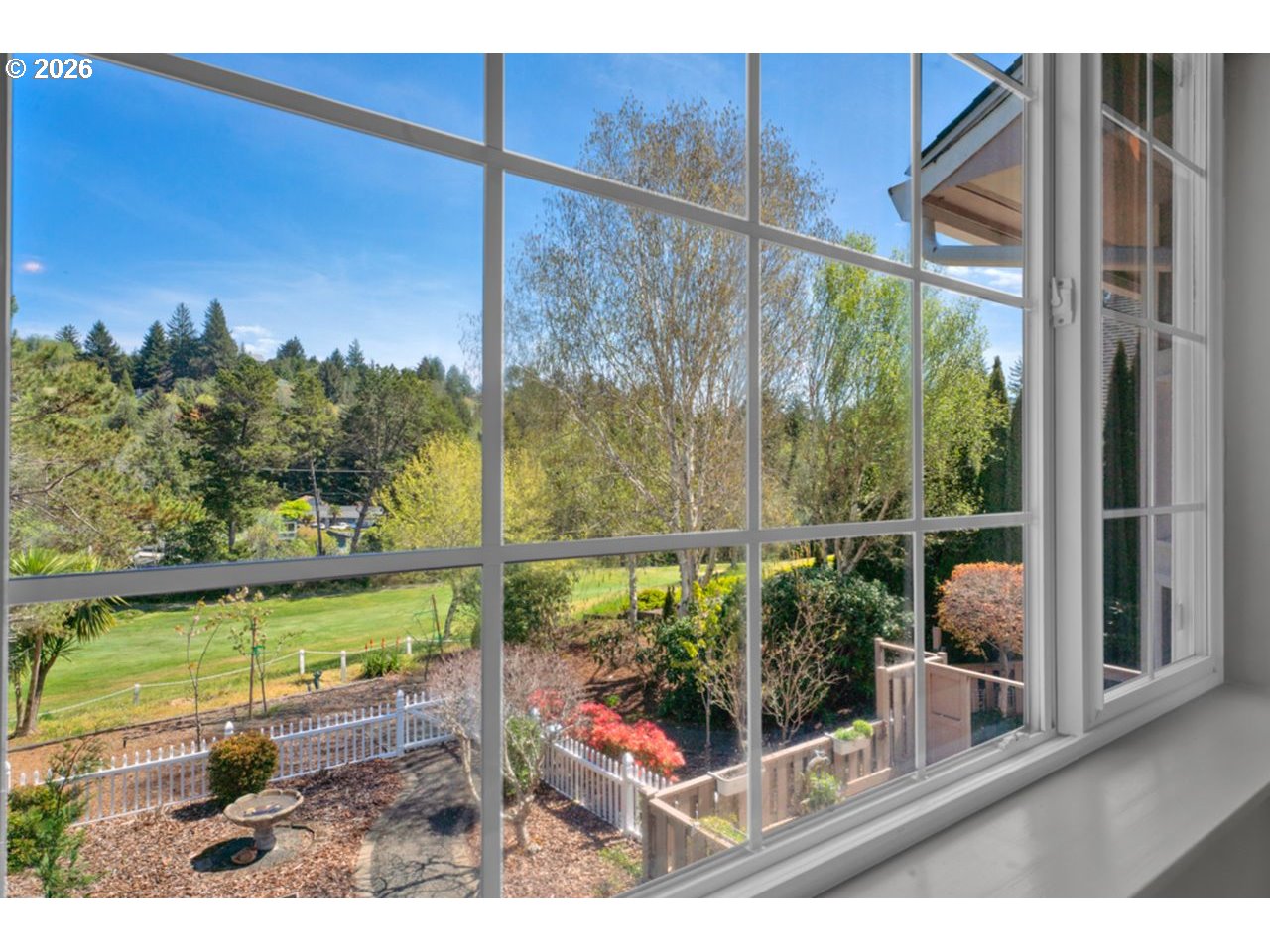 7 Onadoone Court Florence, OR 97439 - Photo 23 of 44 a view of a porch with a floor to ceiling window next to a yard