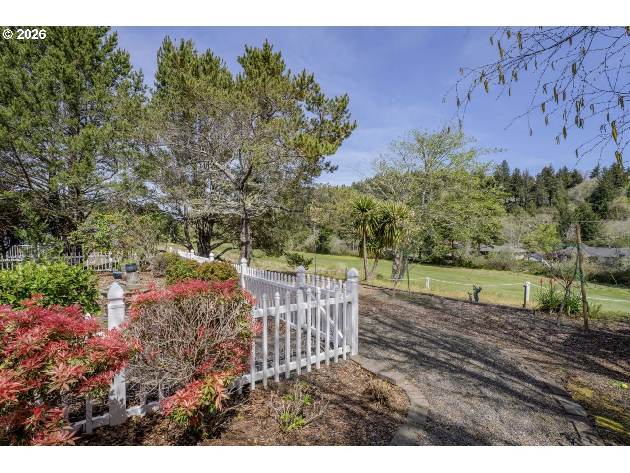 7 Onadoone Court Florence, OR 97439 - Photo 38 of 44 a view of a yard with an outdoor space