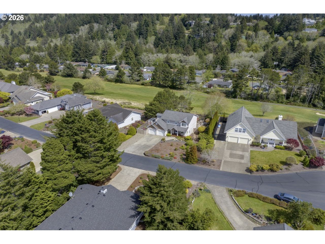 7 Onadoone Court Florence, OR 97439 - Photo 40 of 44 an aerial view of a house with outdoor space