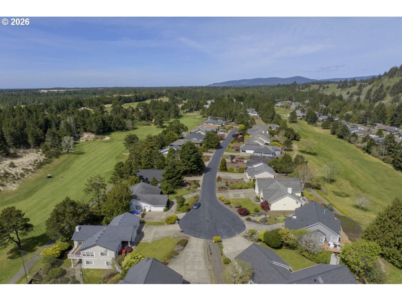 7 Onadoone Court Florence, OR 97439 - Photo 41 of 44 an aerial view of residential house with outdoor space and trees all around