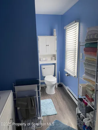 a bathroom with a bath tub
