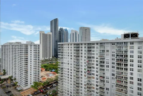 a view of a city with tall buildings