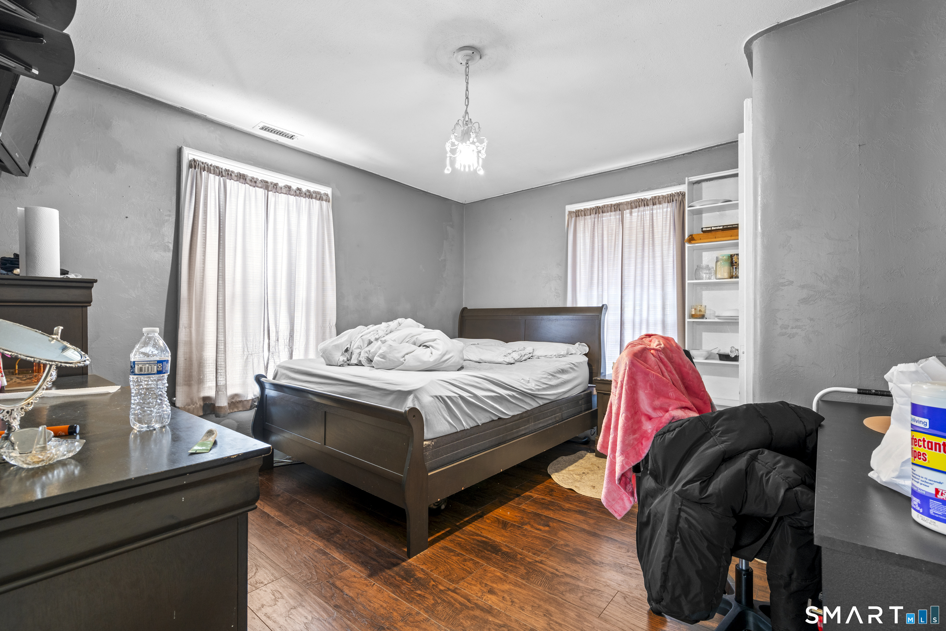 185 Bunker Hill Avenue Waterbury, CT 06708 - Photo 25 of 40 a bedroom with a bed and a window