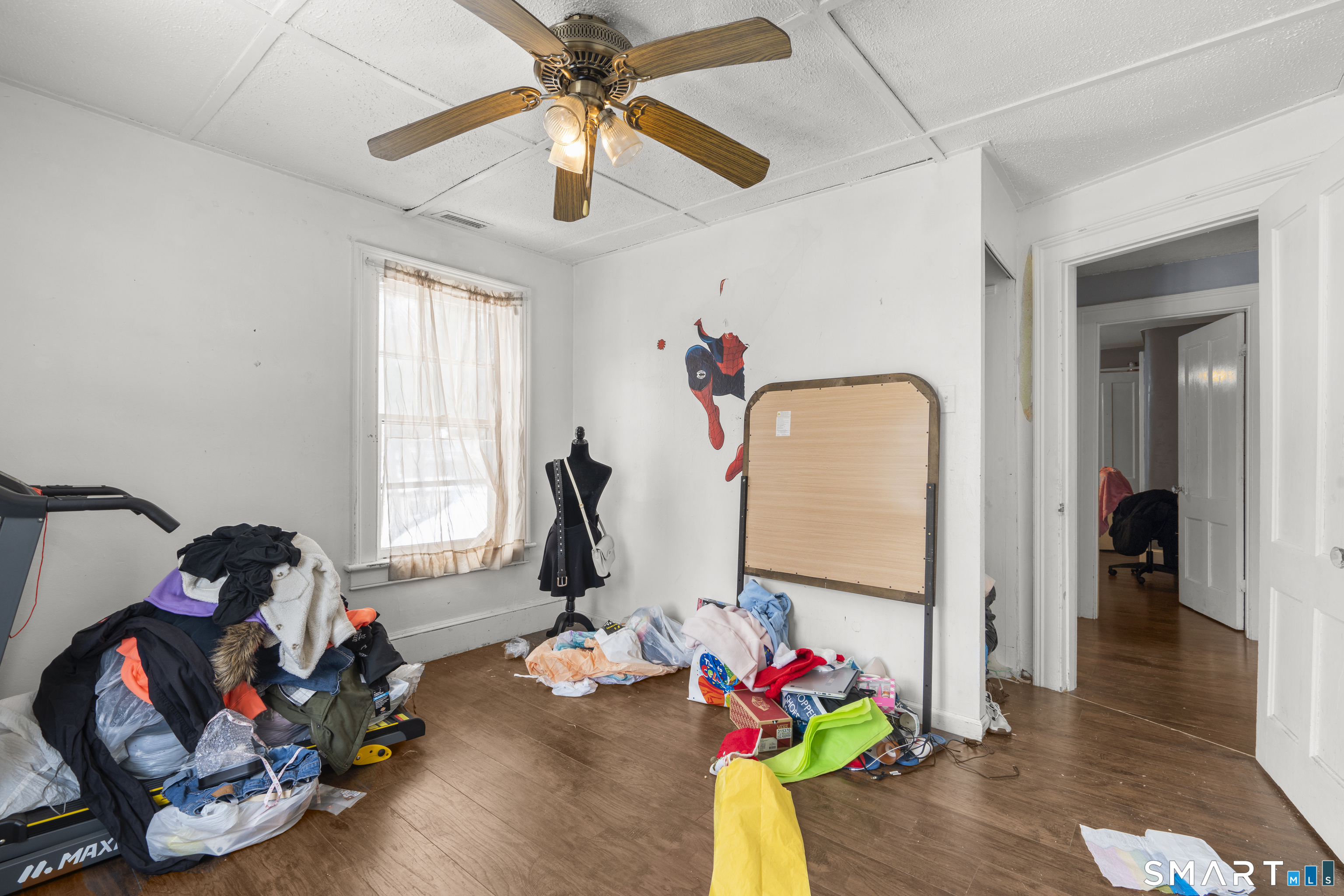 185 Bunker Hill Avenue Waterbury, CT 06708 - Photo 28 of 40 a living room with furniture and a chandelier