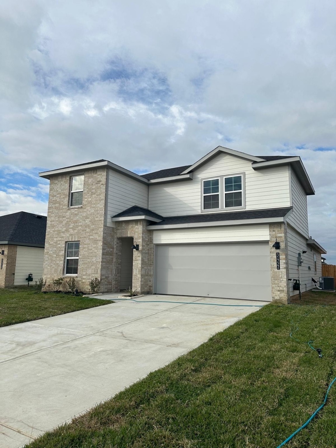 31722 Melkridge Road Fulshear, TX 77441 - Photo 1 of 20 a front view of house with yard