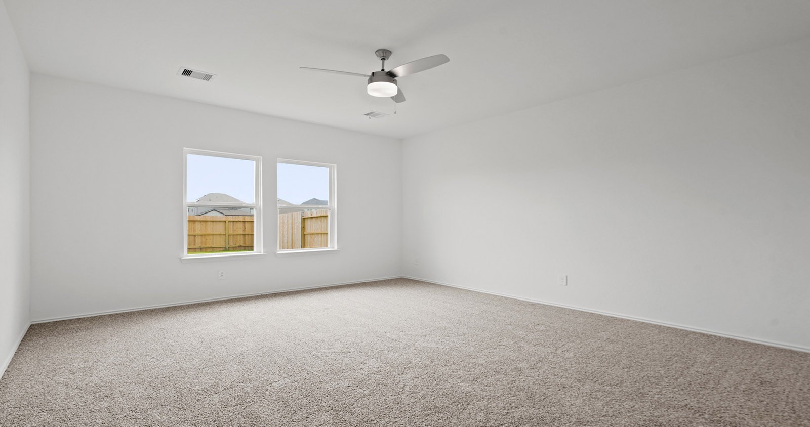 31722 Melkridge Road Fulshear, TX 77441 - Photo 13 of 20 a view of an empty room with a window