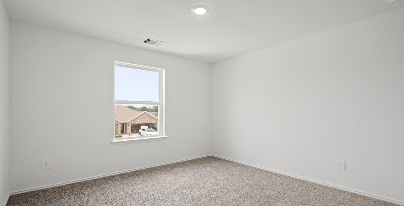 31722 Melkridge Road Fulshear, TX 77441 - Photo 16 of 20 an empty room with windows