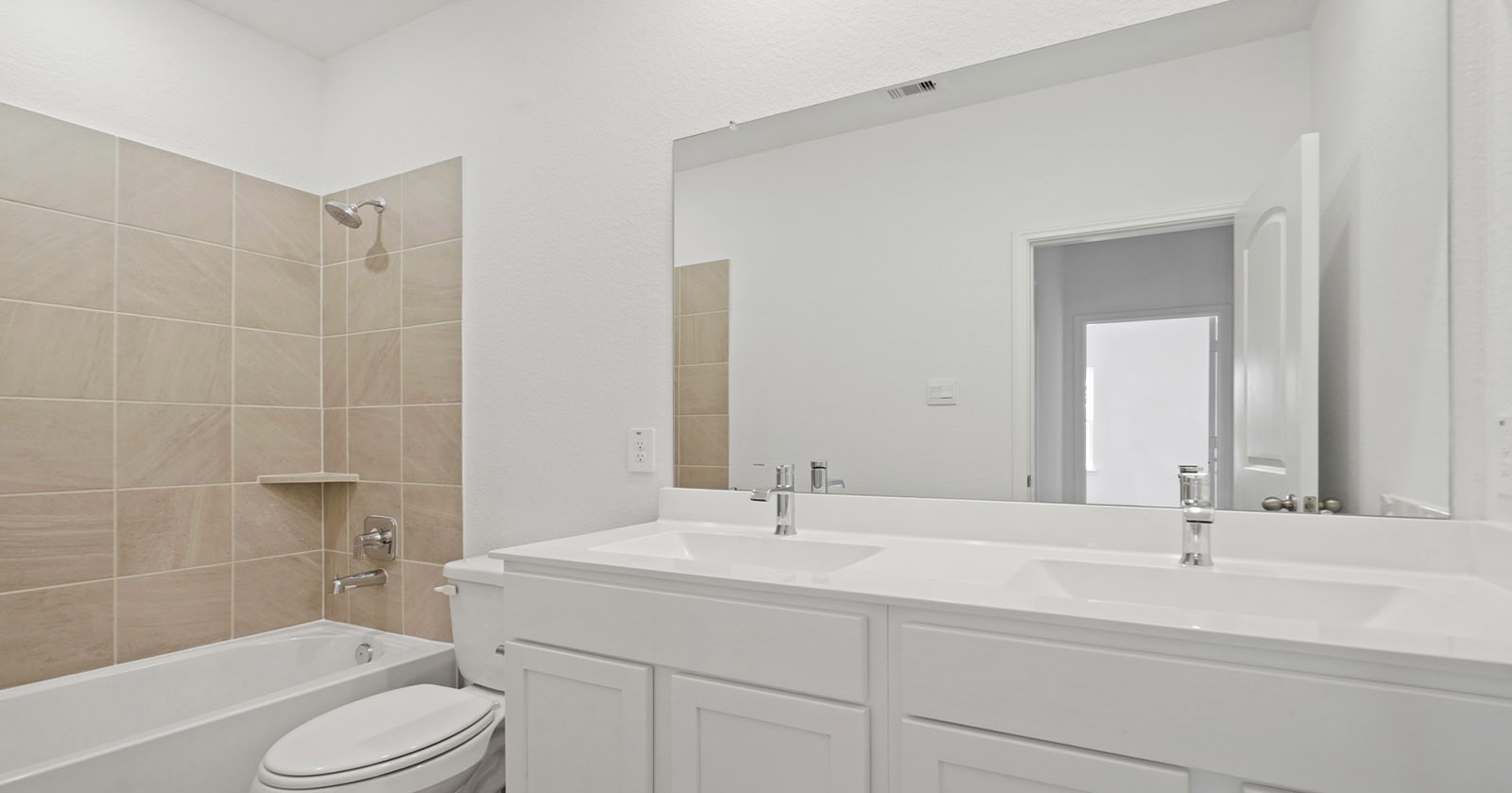 31722 Melkridge Road Fulshear, TX 77441 - Photo 4 of 20 a bathroom with a sink a toilet and shower