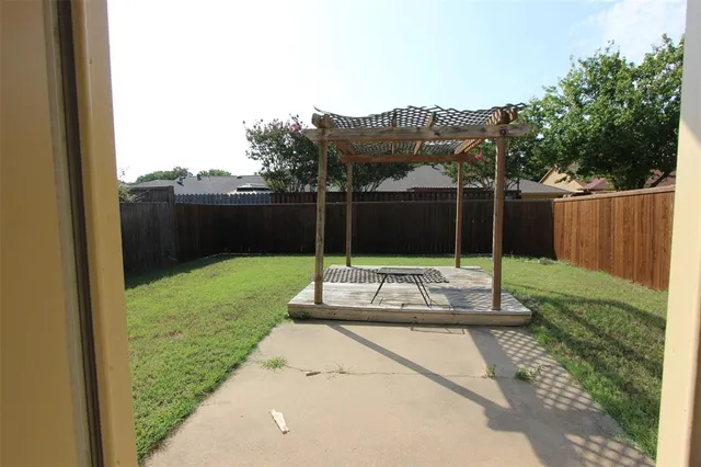 a view of a garden with a slide