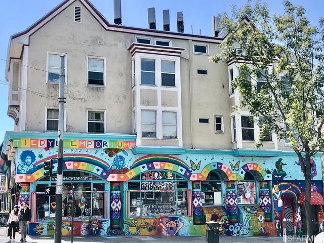 a view of a cars park in front of a store