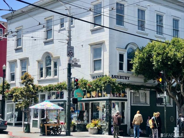a car is parked in front of a building