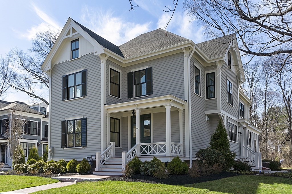46 Hubbard Street Concord, MA 01742 - Photo 1 of 24 a front view of a house with yard and green space