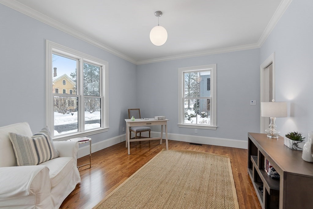 46 Hubbard Street Concord, MA 01742 - Photo 11 of 24 a living room with furniture and a window