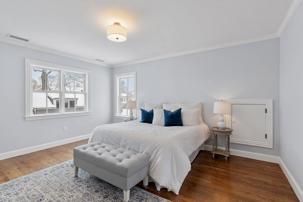 46 Hubbard Street Concord, MA 01742 - Photo 17 of 24 a bedroom with a bed and a couch