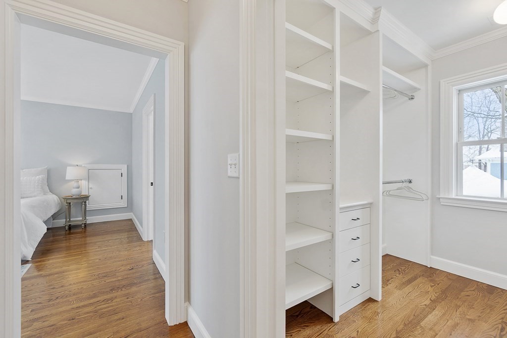 46 Hubbard Street Concord, MA 01742 - Photo 20 of 24 a view of a room with wooden floor closet and windows