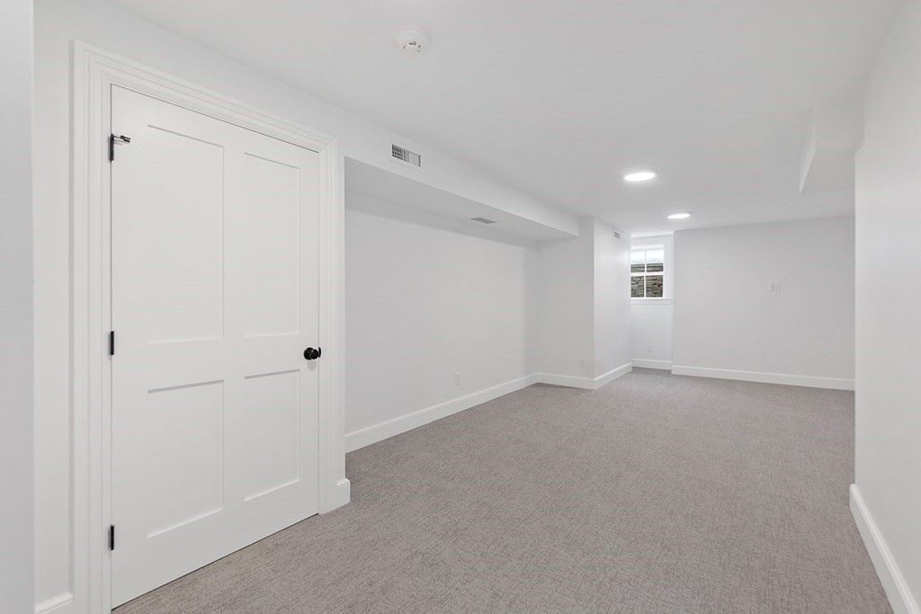 46 Hubbard Street Concord, MA 01742 - Photo 21 of 24 a view of an empty room