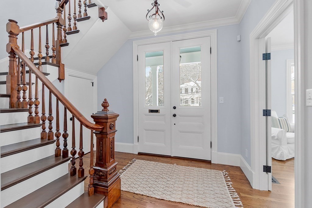 46 Hubbard Street Concord, MA 01742 - Photo 3 of 24 a view of entryway with wooden floor