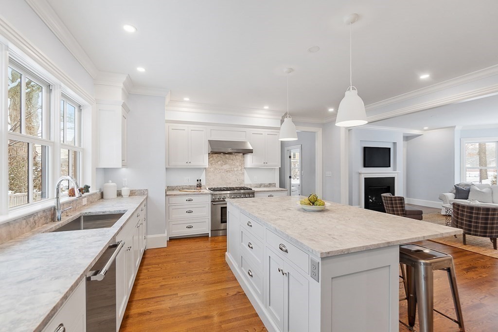 46 Hubbard Street Concord, MA 01742 - Photo 7 of 24 a kitchen with sink stove and refrigerator