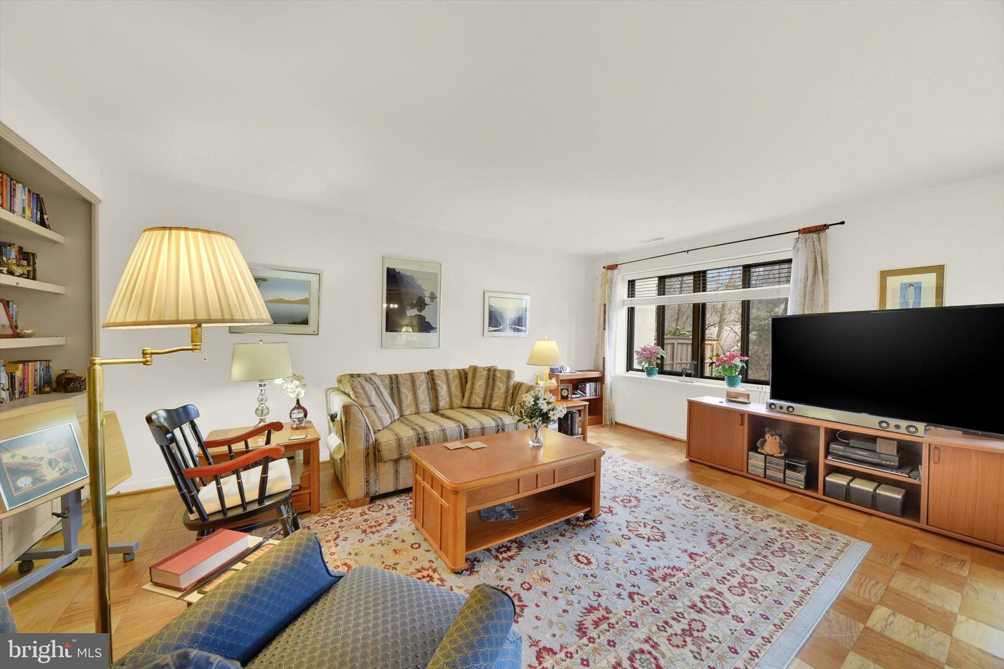 115 Cross Keys Road, Unit R115A Baltimore, MD 21210 - Photo 3 of 16 Spacious Living Room with Wood Flooring